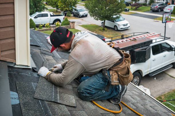 Professional Roofing technician working in Bowling Green, VA